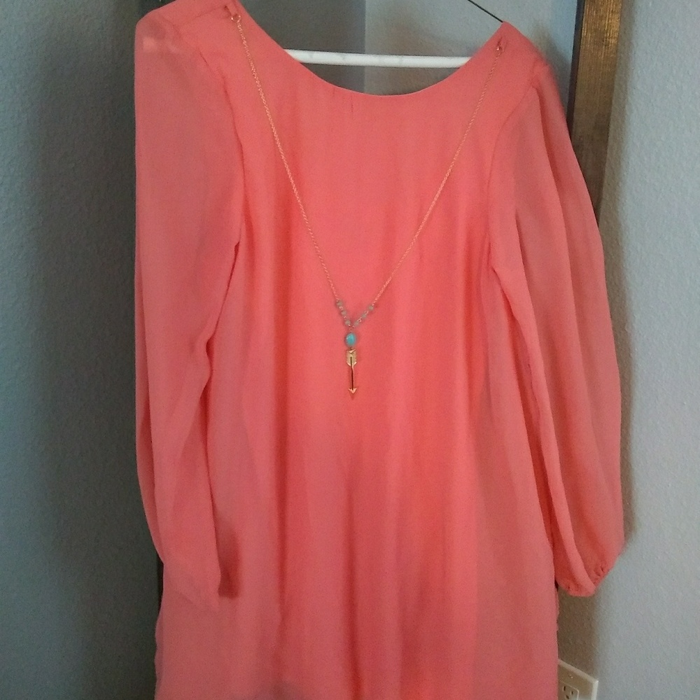 Coral dress with necklace